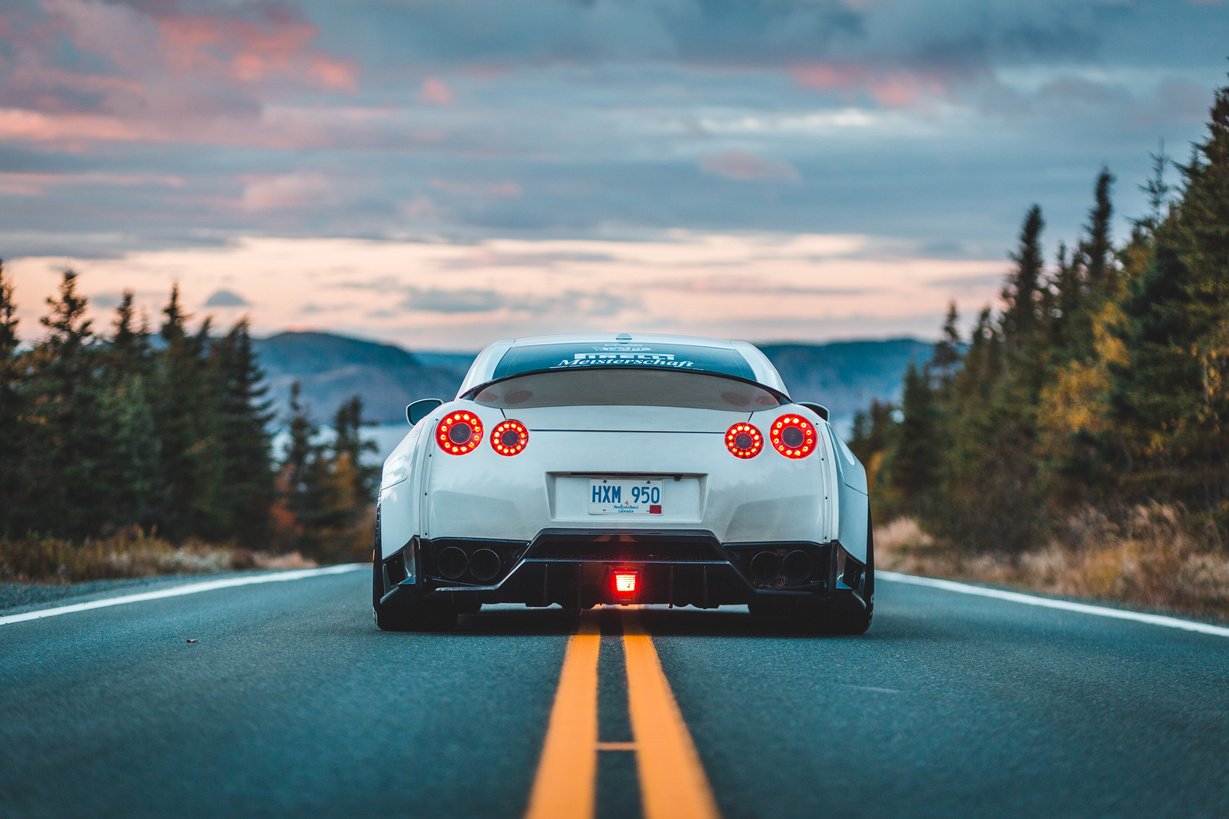 Photo Of White Cars On Road